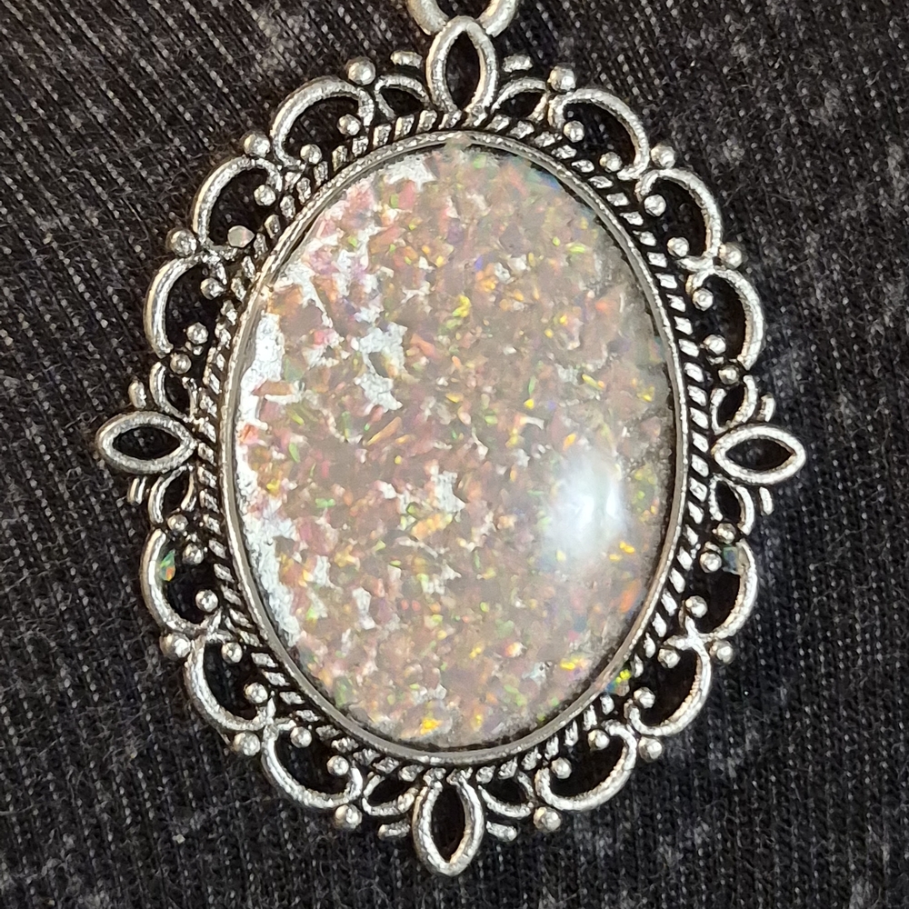 Vintage-Inspired Silver Brooch with Opal Accents